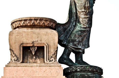 Part of Buddha Statue With Lotus Flower Shaped Base Isolated On White Backgroundの写真素材
