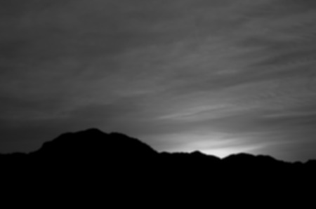 Defocused Sunset Behide Mountain Background, Blur Abstract Beautiful Natureの写真素材