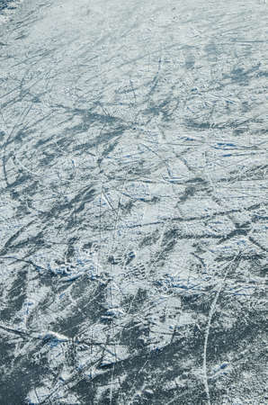 skating ice  ring texture covered with snowの写真素材