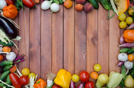 vegetables and fruits composition on wooden tableの写真素材