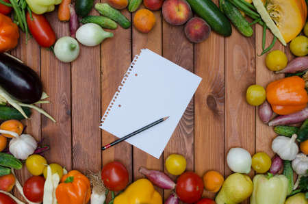 vegetables and fruits composition on wooden tableの写真素材