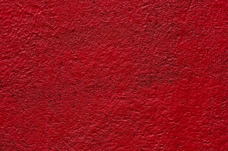 texture of red plaster wall backgroundの写真素材