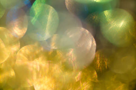 Christmas background with bokeh defocused lightsの写真素材