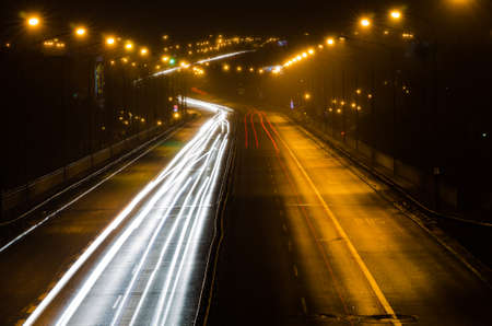 motion blurred cars lights at night in Warsawの写真素材