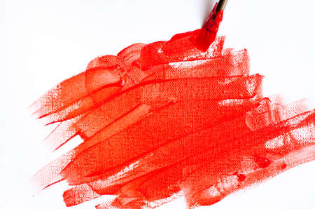 brush painting red backgrount on whiteの写真素材