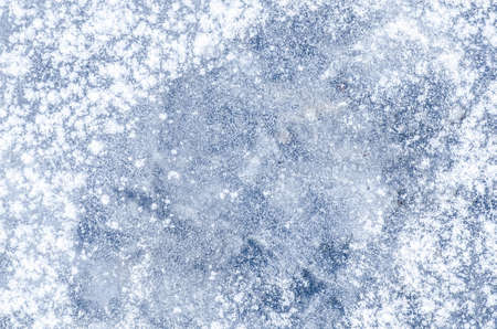 white snowflakes on blue  iceの写真素材