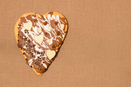 heart shape  gingerbread cake on brown backgroundの写真素材