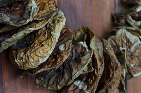 dried porcini mushrooms on wooden background