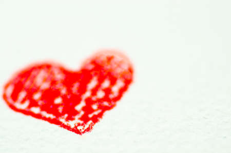 red heart shape on white paperの写真素材