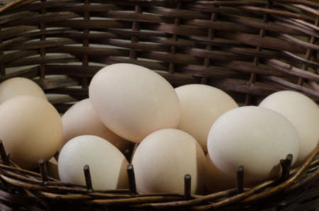 eggs in easter wicker basketの写真素材