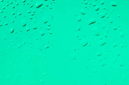 closeup to  water drops on glass backgroundの写真素材