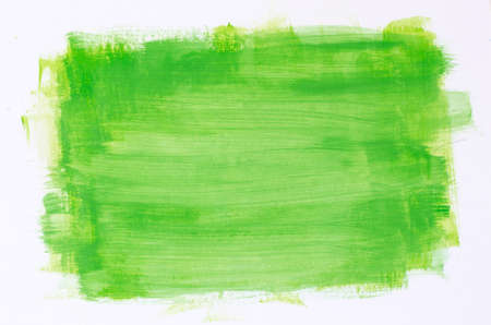 green watercolor painting texture on white backgroundの写真素材