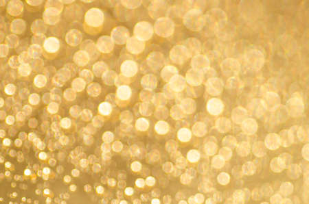 gold abstract blurred bokeh lights background