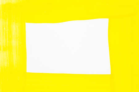 yellow watercolor painted texture on white background paperの写真素材