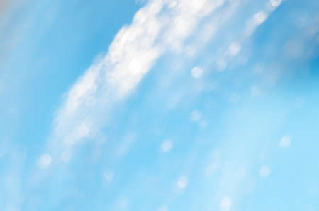 defocused blue flowing water background textureの写真素材