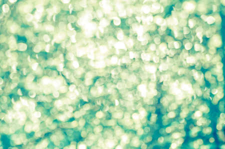 blurred blue bokeh abstract lights backgroundの写真素材