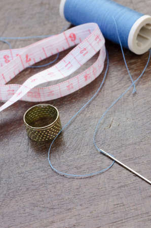 sewing acesories on wooden table