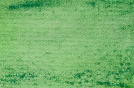green watercolor painted texture backgroundの写真素材