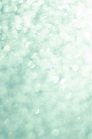 blue abstract blurred bokeh lights backgroundの写真素材