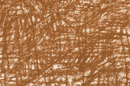 brown crayon drawings on white paper background textureの写真素材