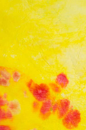 yellow  watercolor painting on crepe paper background textureの写真素材