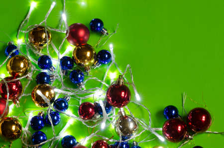 multicolored Christmas lights and balls backgroundの写真素材