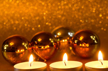 Christmas candles and balls still lifeの写真素材