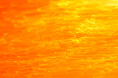 orange motion blurred lights backgroundの写真素材