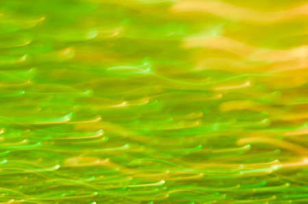 green motion blurred lights backgroundの写真素材