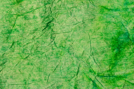 green decorative crepe paper background textureの写真素材