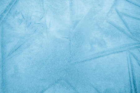 closeup to blue ice background texture