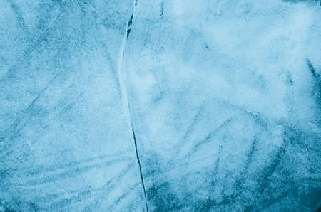 closeup to blue ice background textureの写真素材