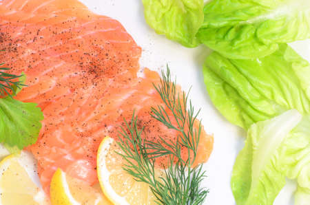 salmon carpaccio with lemon and fresh herbs