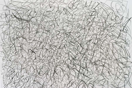 crayon doodles on white paper background