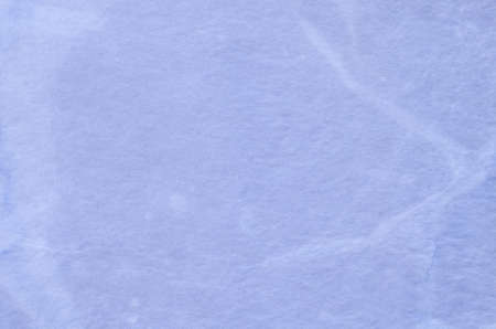 blue painted crepe paper background textureの写真素材