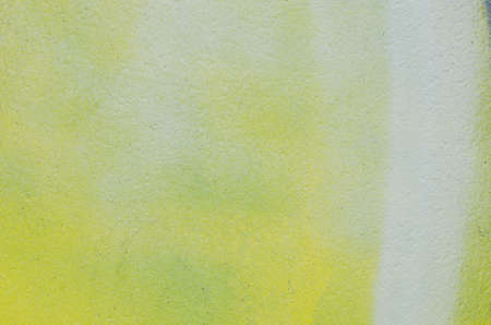 yellow painted wall texture backgroundの写真素材