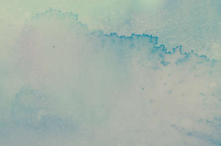 blue watercolor painted background textureの写真素材