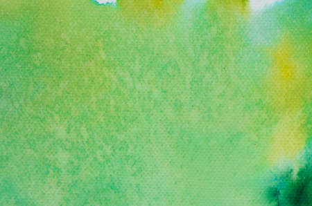 green watercolor painted background textureの写真素材