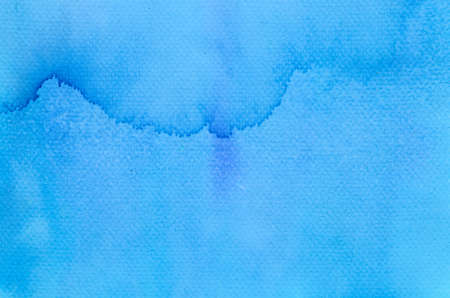 blue watercolor painted background textureの写真素材