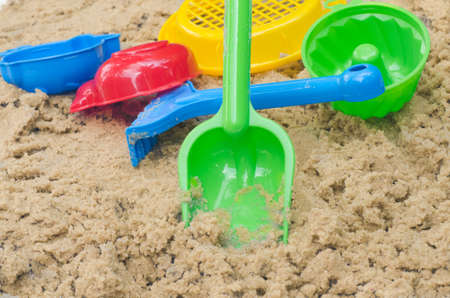 closeup to toys in sandpidの写真素材