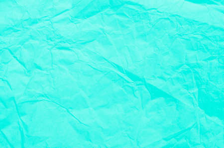 crumpled green paper tissue  backgground textureの写真素材