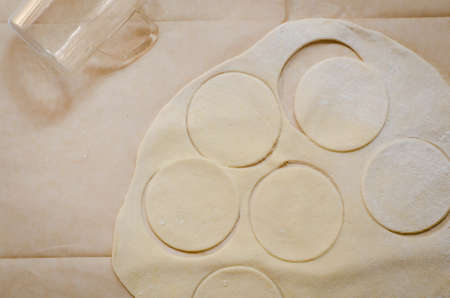 making dumplings on paper backgroundの写真素材