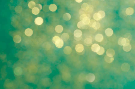 green color blurred lights bokeh backgroundの写真素材