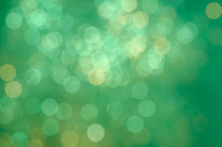 green color blurred lights bokeh backgroundの写真素材