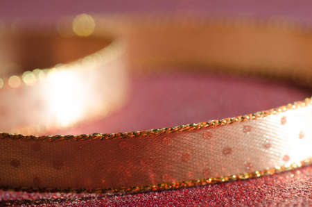closeup to decorative golden  ribbonの写真素材