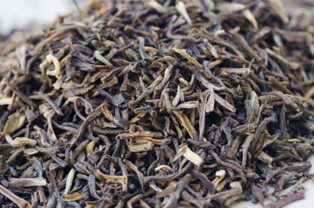 closeup to dried green tea leaves