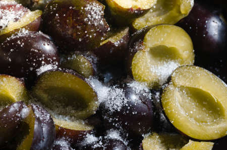 closeup to fresh purple plumsの写真素材