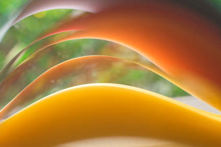 macro of colorful curved sheets of paper