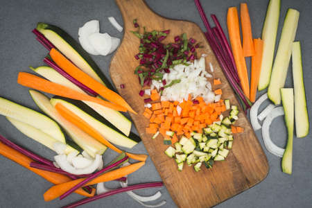 group of chopped vegetables on wooden board