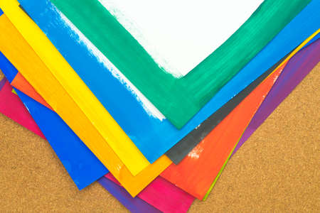 Group of multicolored painted paper sheetsの写真素材